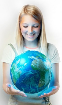Girl holding the Planet Earth